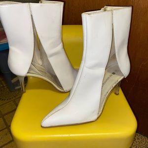 Transparent heeled zip boots